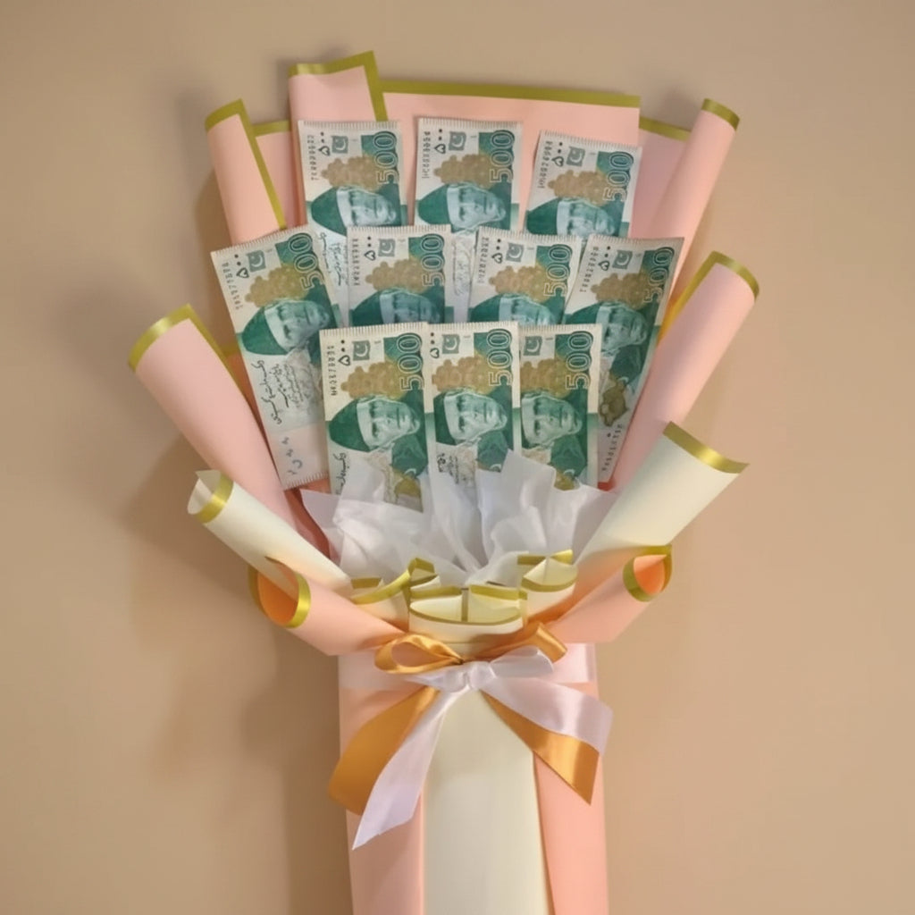 Bouquet made of banknotes with decorative ribbons on a white background