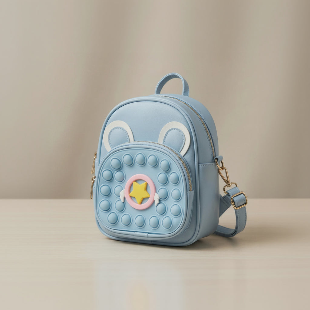 Light blue backpack with animal ears and a star design on a beige background