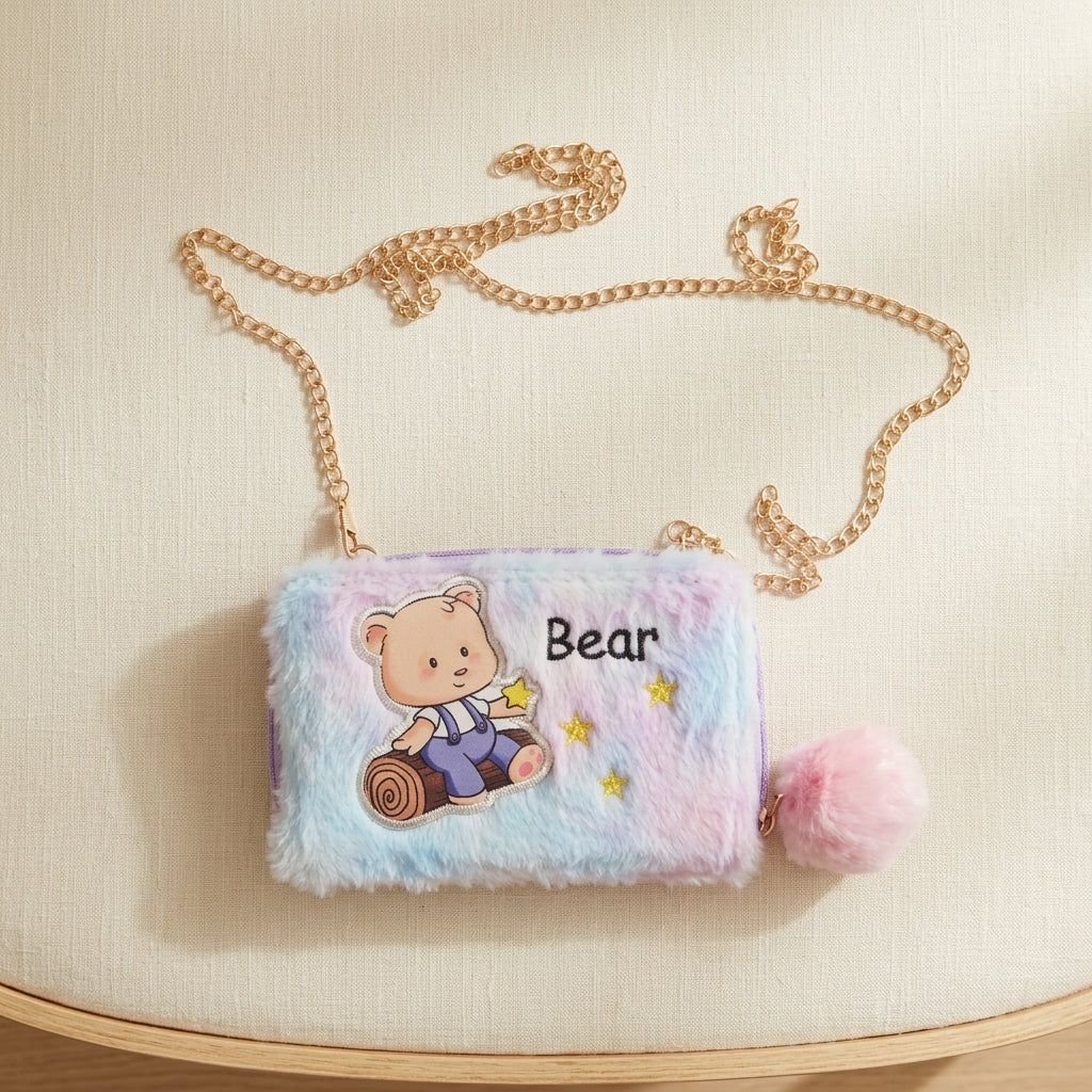 Fluffy children's bag with teddy bear design and gold chain on a beige surface